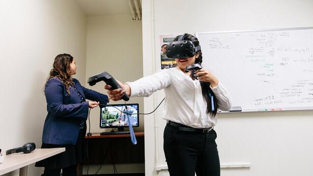 Student using VR equipment in class