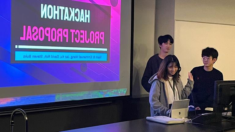 Students present project at hackathon