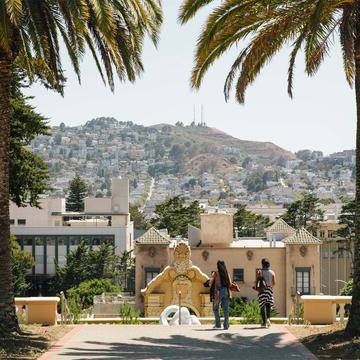 View of city between the palms of Lone Mountain.